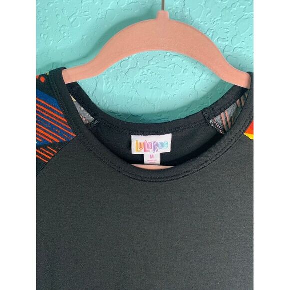 LuLaRoe Black Randy with design on sleeves size Medium - Picture 2 of 6